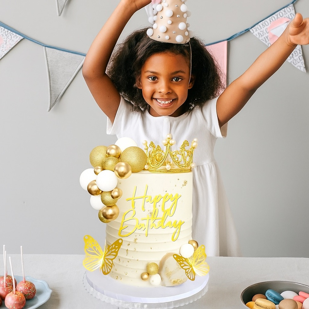 Gold and White Birthday Cake with Crown Topper